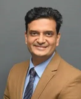 Dr.Milind Niak       