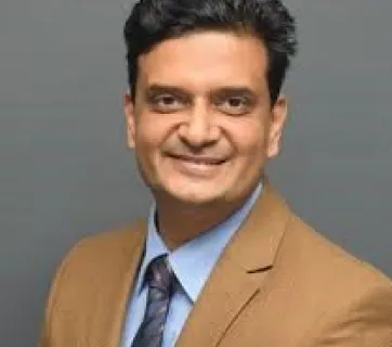 Dr.Milind Niak       
